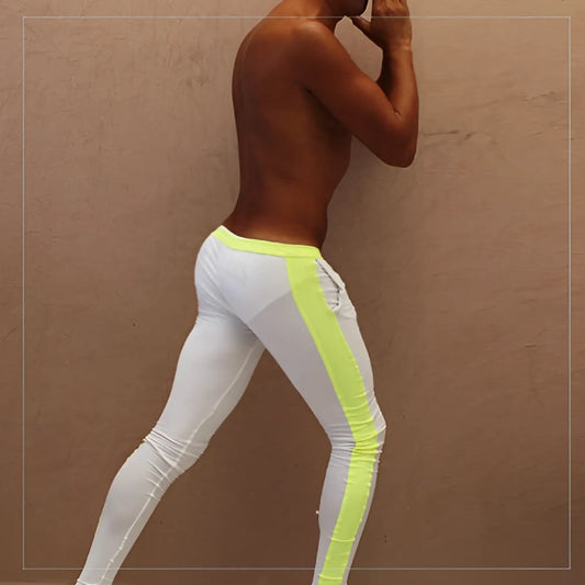 White icker sea side stripe runner pants with neon yellow side stripe and matching waistband for athletic use