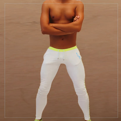 White icker sea side stripe runner pants with neon yellow waistband and blue logo on thigh athletic leggings