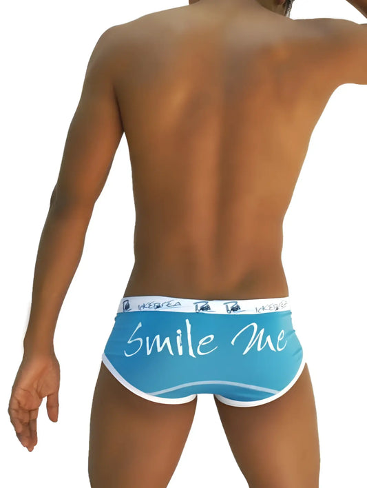 Blue men’s briefs with white trim and smile me cursive script from icker sea brief underwear coi-13-14