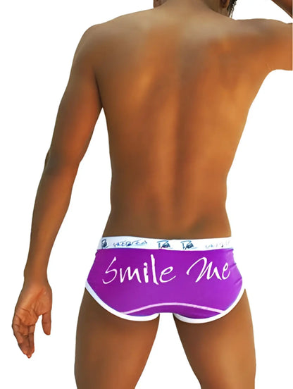 Purple smile me briefs underwear with white trim and cursive lettering by icker sea COI-13-14