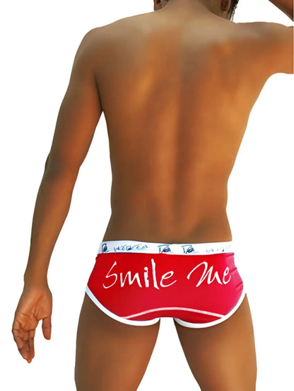Red smile me briefs with white trim featuring a playful script design from Icker Sea COI-13-14 underwear collection