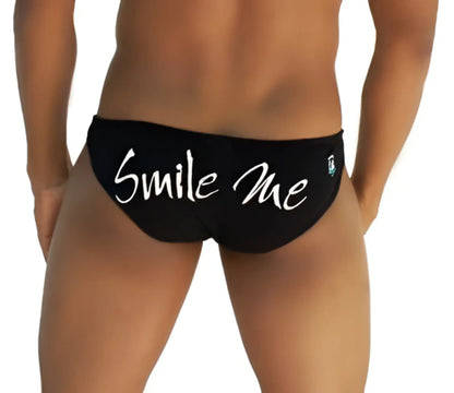 Black icker sea smile me slip bikini underwear showing back with white smile me cursive script on swim trunks