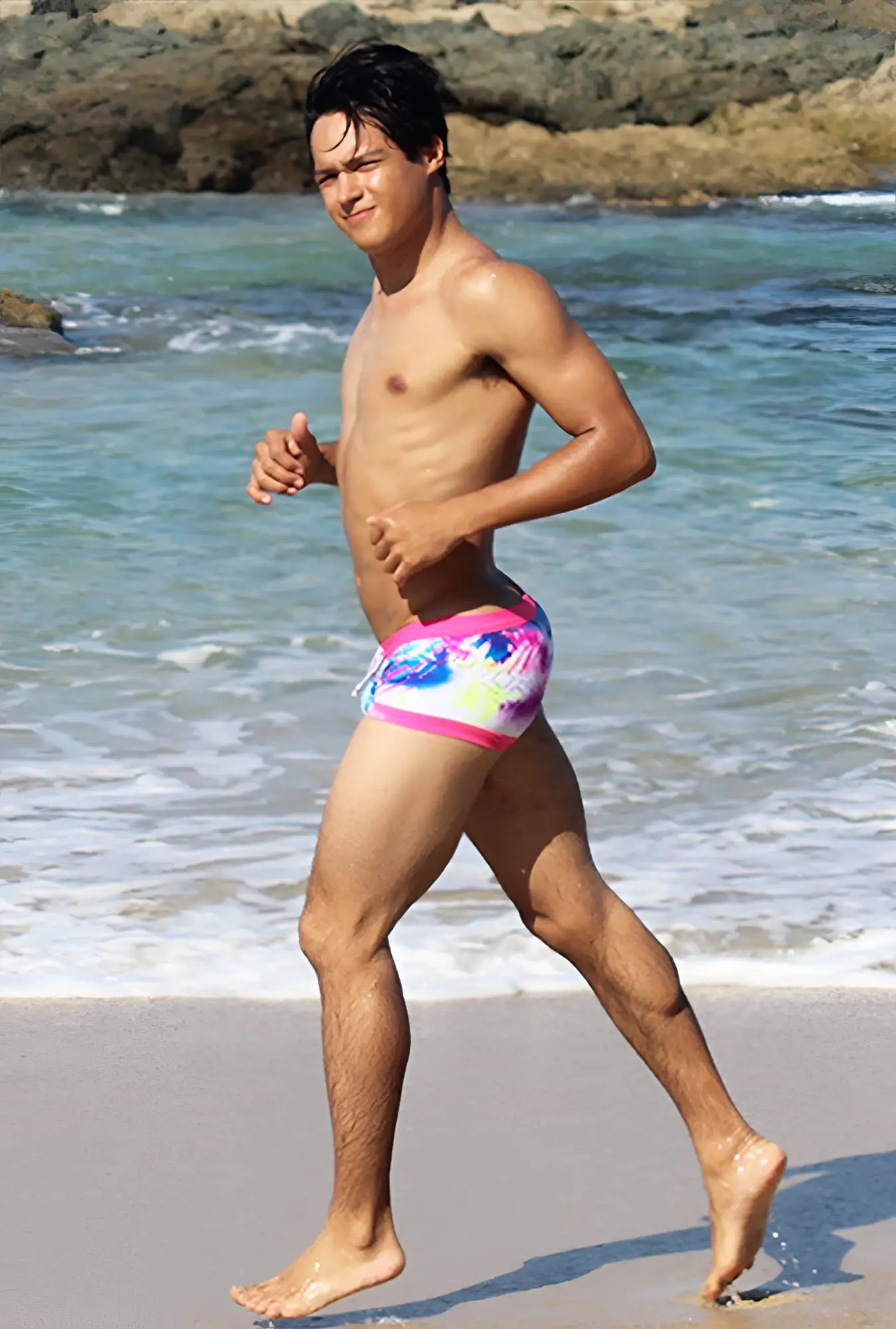 Icker Sea spring square cut trunk swimwear with vibrant tie-dye pattern and bright pink waistband in pink and blue