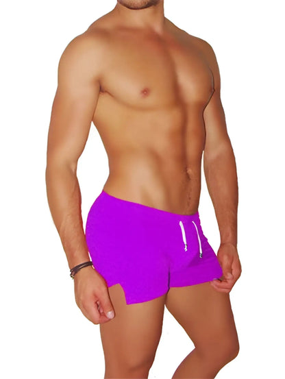 Vibrant purple icker sea tennis side slit swim trunks with white drawstrings designed for active beachwear