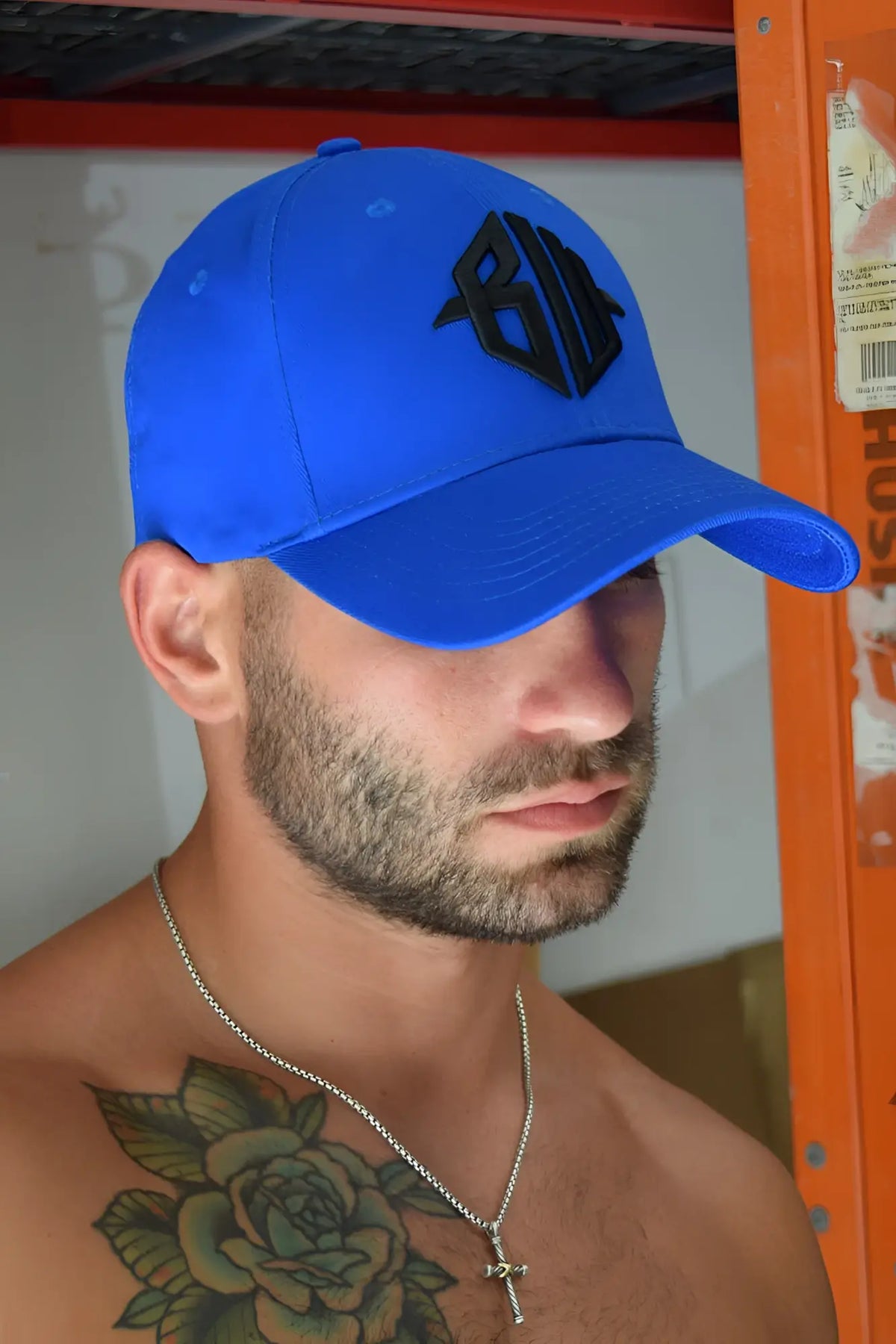Bright blue icon cap baseball hat with black embroidered logo on front perfect for casual wear
