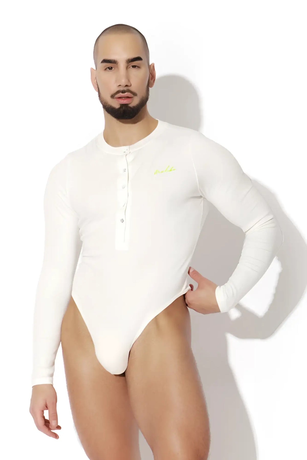 White infinity long sleeve button up bodysuit with button-front neckline and neon green logo on chest