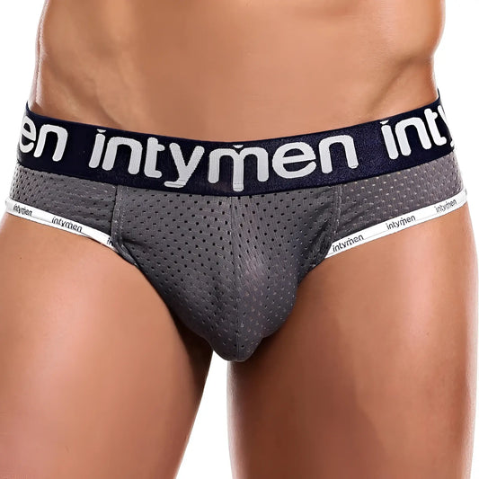 Gray perforated mesh briefs with navy blue waistband and white intymen branding from intymen ine018 jockstrap collection