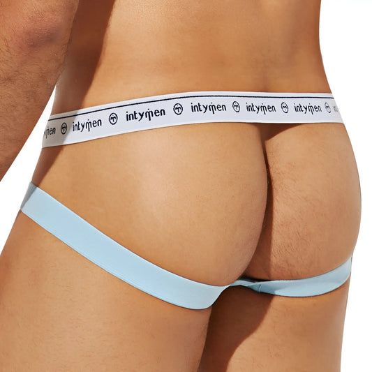 Light blue Intymen INE031 jockstrap briefs with white waistband featuring repeating black logo text and symbols