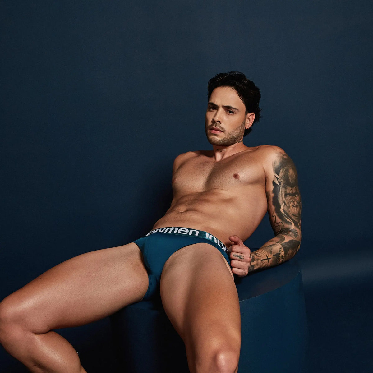 Menâ€™s teal intymen ine034 jockstrap briefs with white men logo on waistband for support and comfort