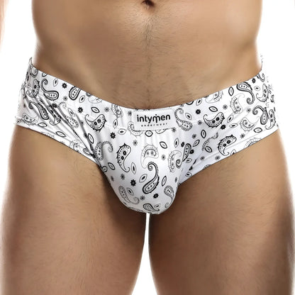 White menâ€™s briefs with black paisley and floral patterns featuring intymen underwear branded label ing067 boxer trunk