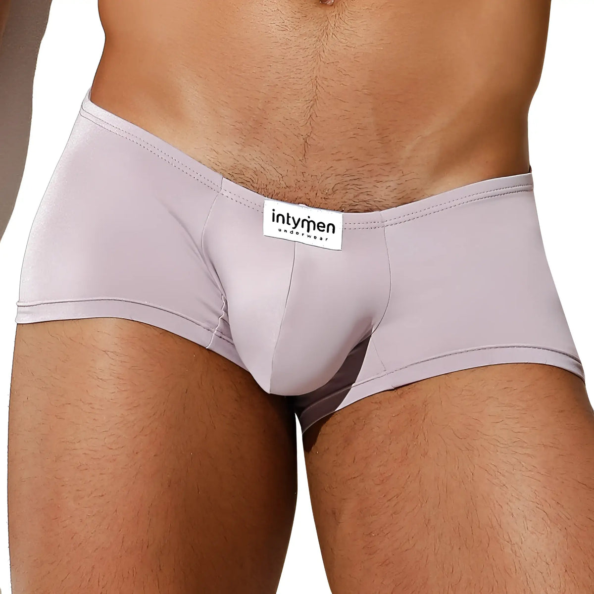 Light gray form-fitting intymen ing071 boxer trunk with subtle sheen and white logo waistband label for men