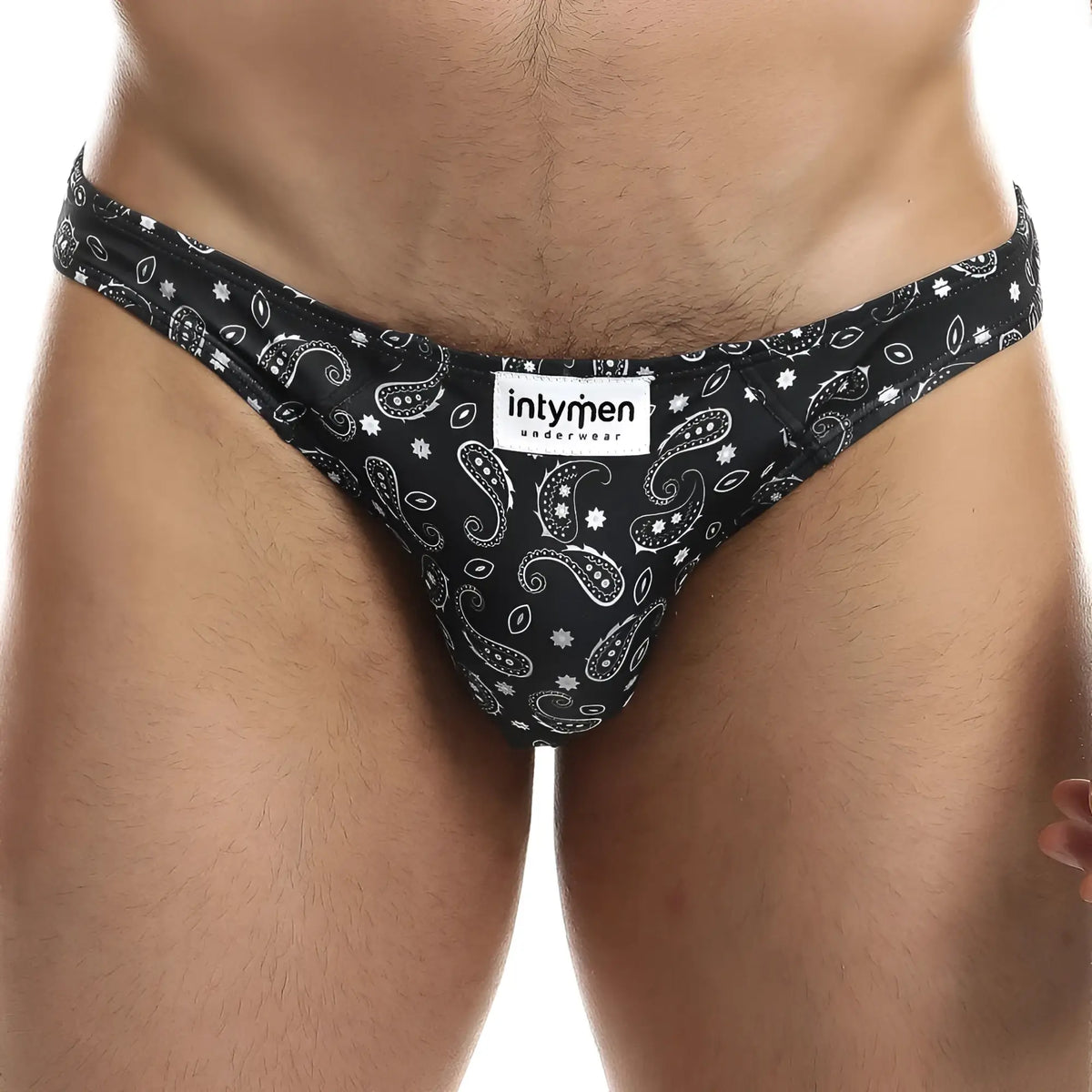 Black and white paisley patterned Intymen INI027 bikini brief with Intymen underwear brand label for men