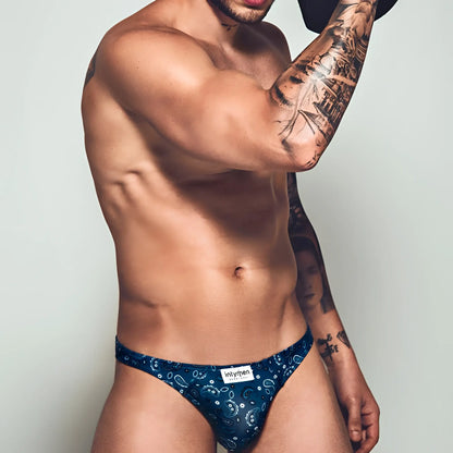 Navy blue patterned intymen ini027 bikini brief with a white brand label on soft breathable fabric