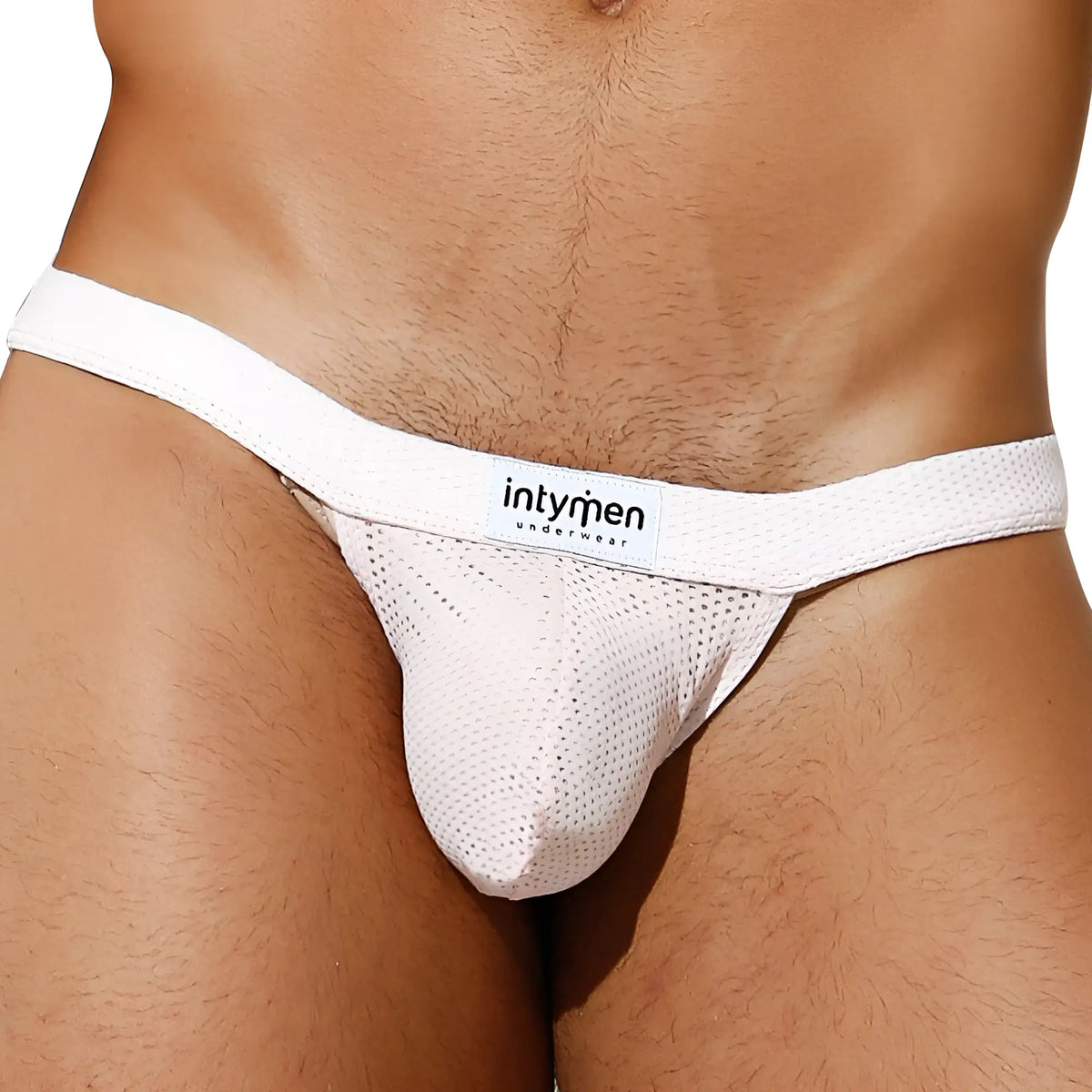 White mesh bikini briefs with intymen underwear branded label showcasing breathable fabric and stylish design