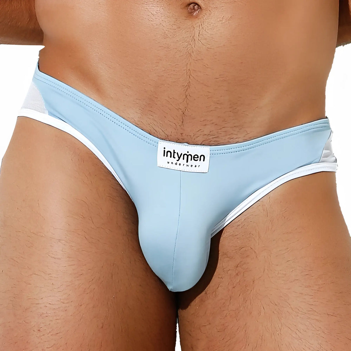 Light blue form-fitting thong with white trim and intymen underwear label intymen ini035 bikini brief front view