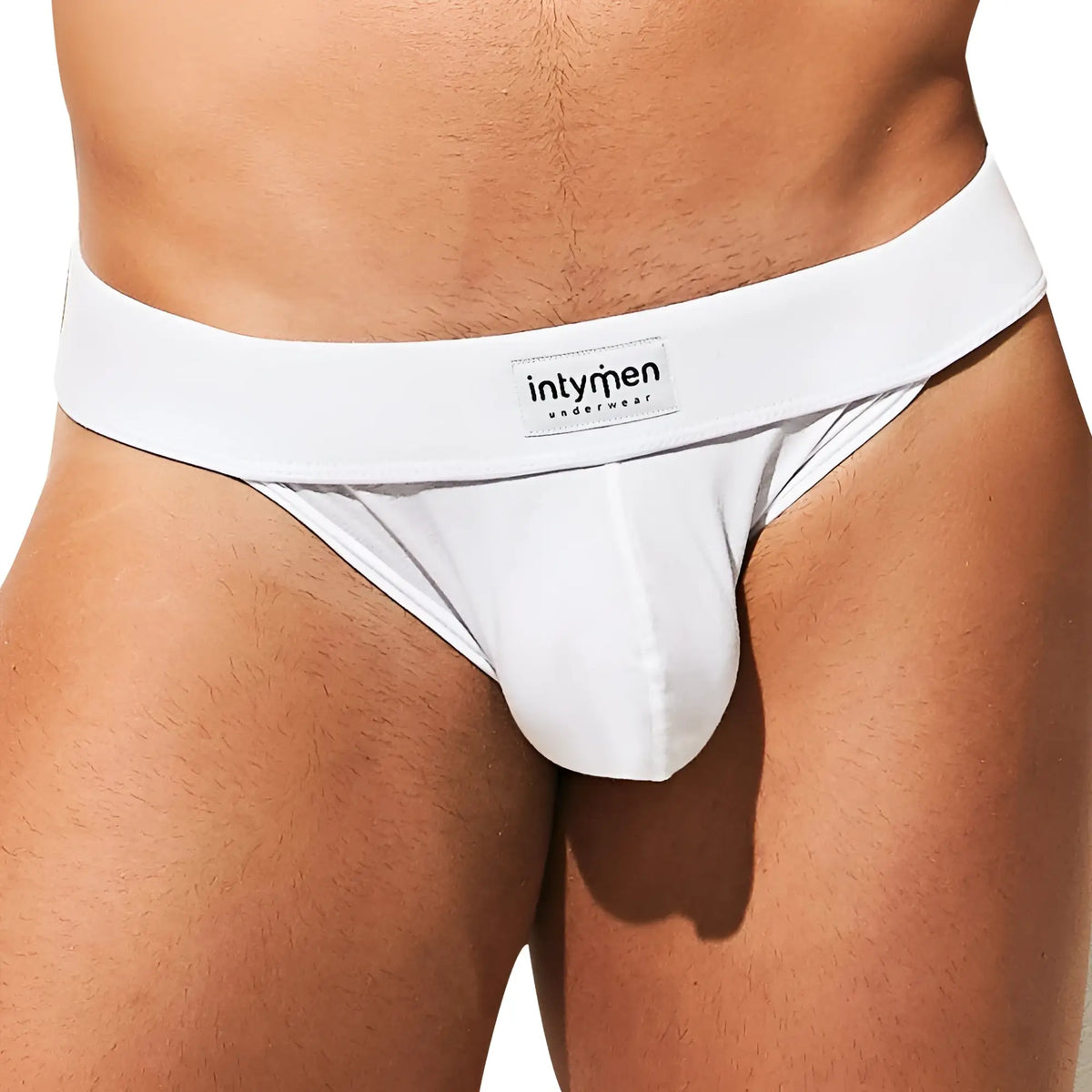 White intymen ini036 bikini brief with smooth form fitting design and branded label on the waistband