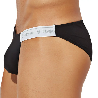 Black Intymen INI039 bikini briefs with a white waistband featuring the brand logo for comfortable daily wear
