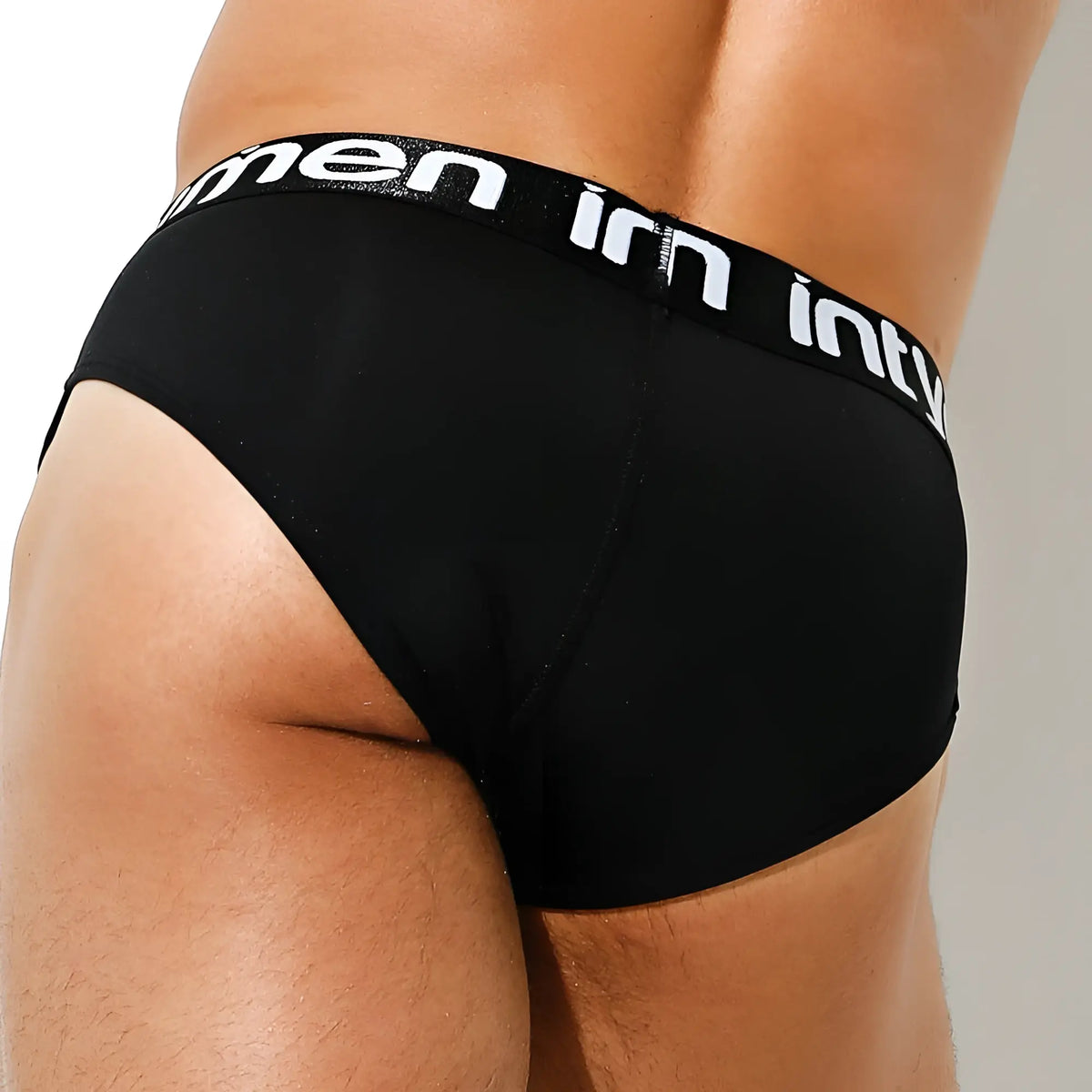 Black menâ€™s briefs Intymen INJ066 in black with a white inty logo on the waistband for comfortable daily wear