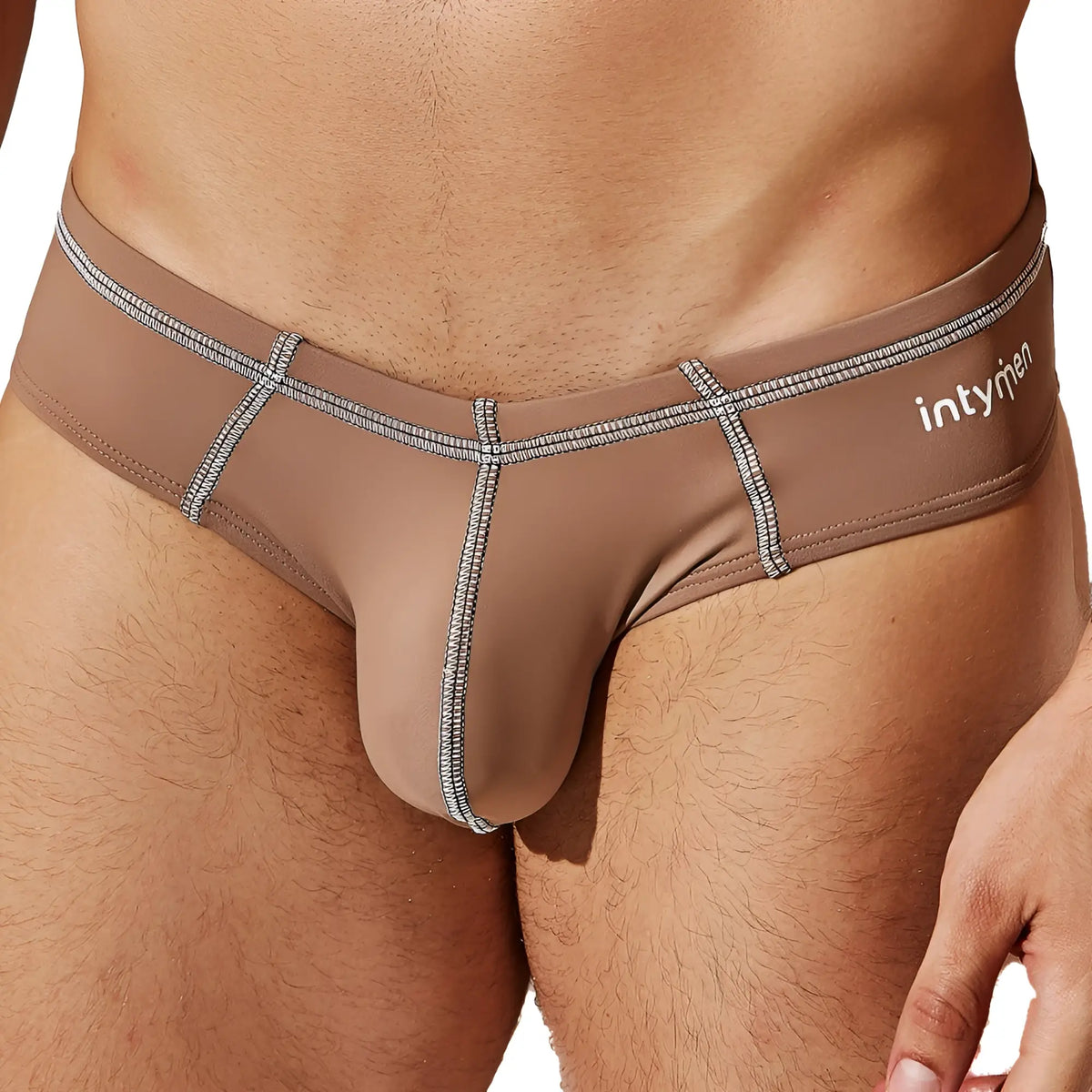 Tan Intymen INJ084 briefs with silver-tone stitched detailing showing front side for comfortable everyday wear