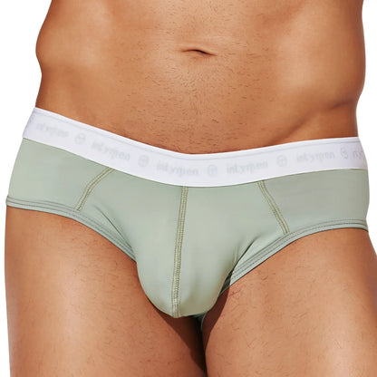 Intymen inj088 brief in mint green with a white elastic waistband featuring the intymen logo repeated
