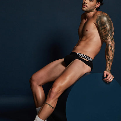 Black Intymen inj095 briefs with white branded waistband in a comfortable cotton blend for everyday wear