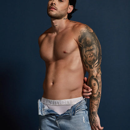 White cotton Intymen INJ096 briefs with gray elastic waistband featuring the Under Armour logo