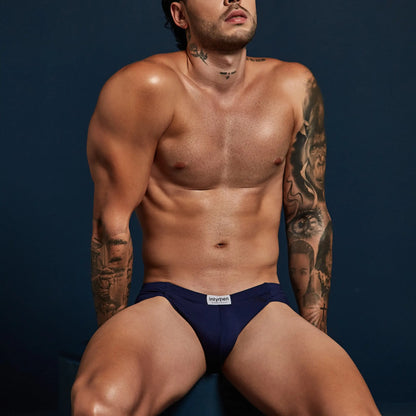 Navy blue Intymen INJ098 briefs with a white brand label on the waistband made from soft breathable fabric