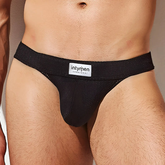 Black mesh briefs with white intymen underwear label on waistband from intymen ink014 thong collection