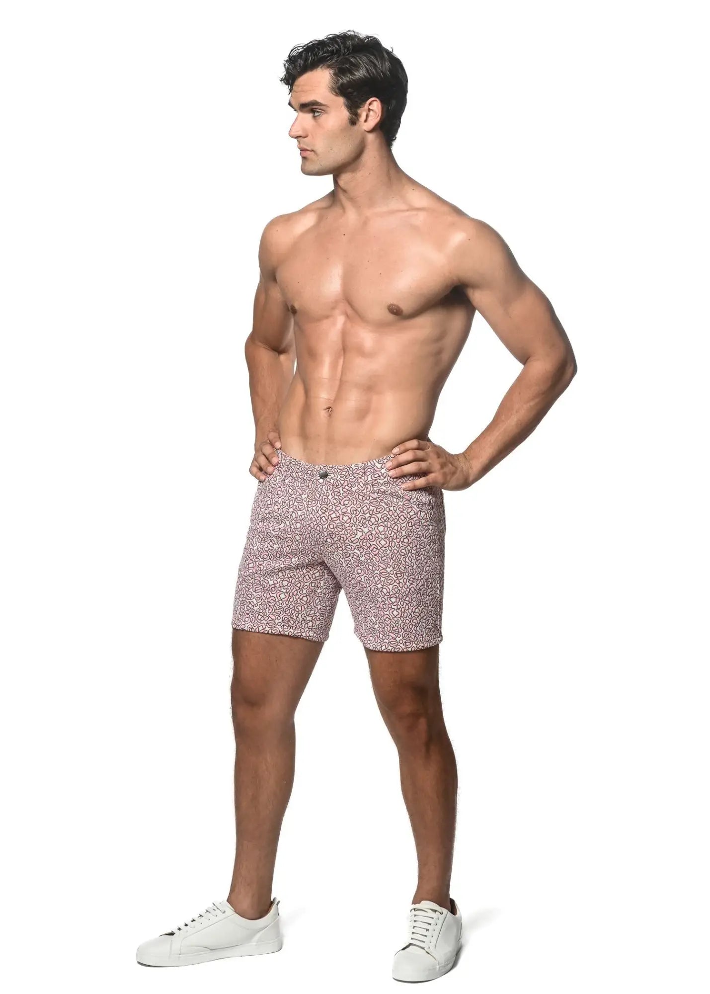 Pink jacquard printed stretch knit shorts with a subtle speckled pattern perfect for casual wear