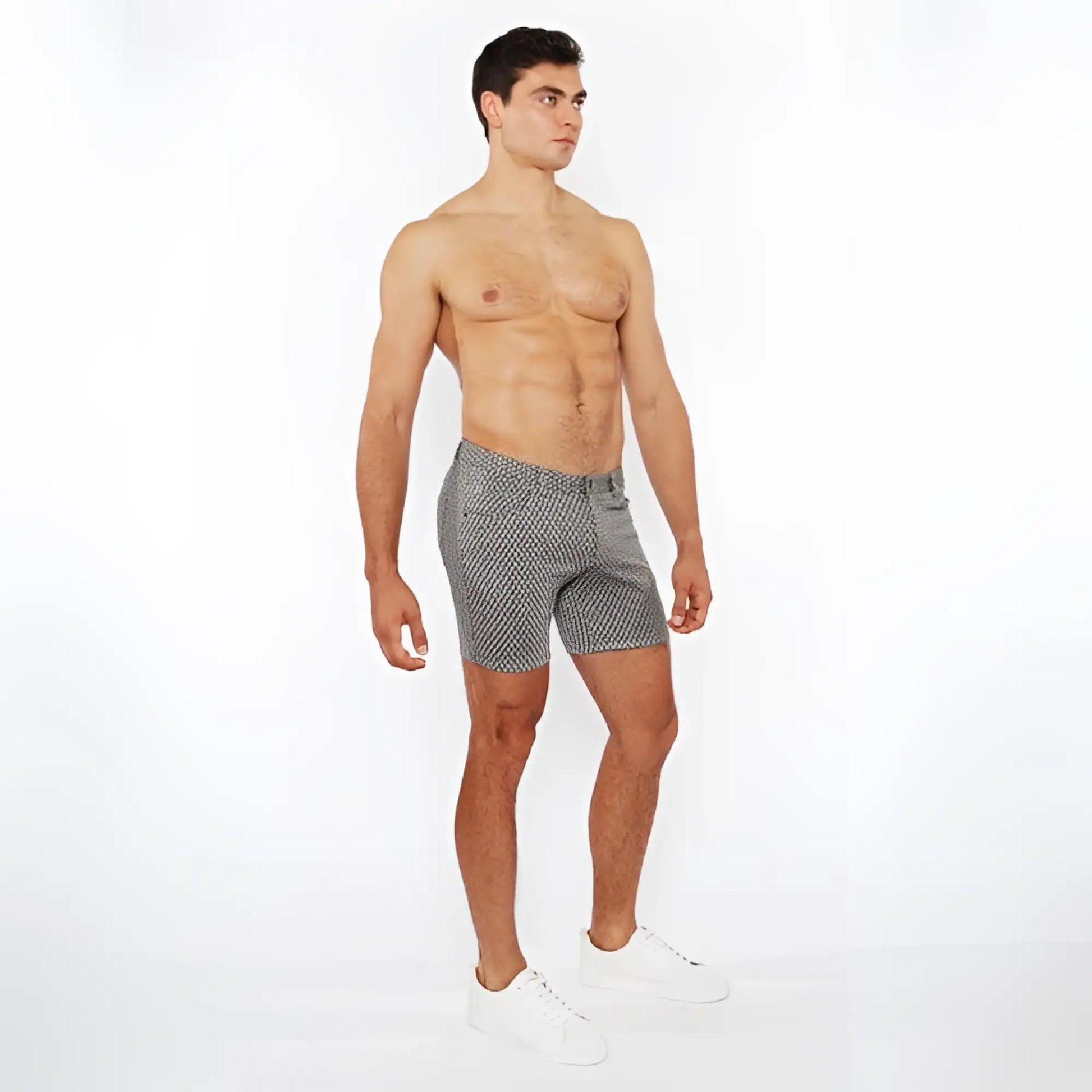 Gray jaquard stretch knit chino shorts with subtle white polka dots, classic tailored fit, and button closure