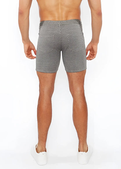 Gray jaquard stretch knit chino shorts with subtle white polka dot pattern made from lightweight fabric