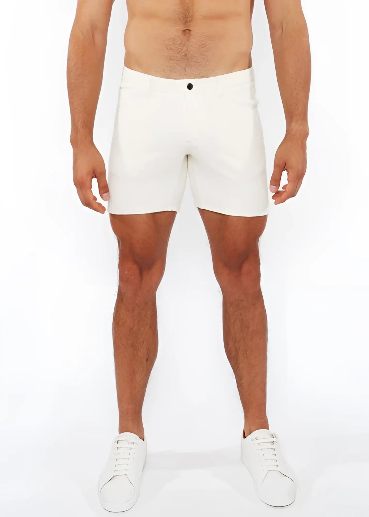White jaquard stretch knit chino shorts with sleek form-fitting design and black button waistband