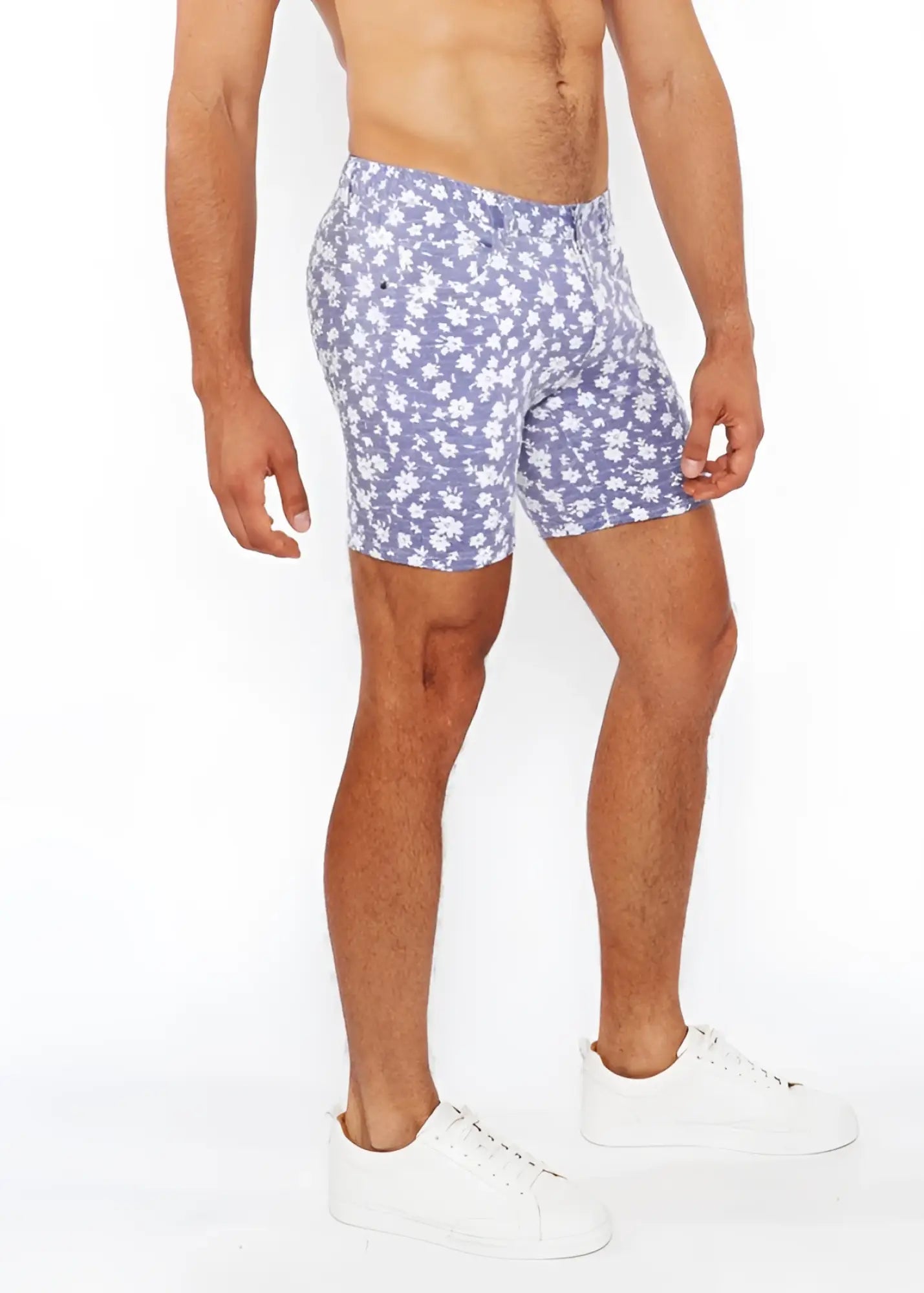 Blue floral patterned jaquard stretch knit shorts with white flowers on light blue fabric