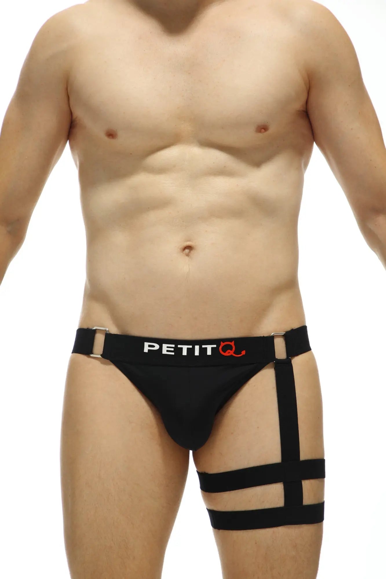 Black petitq brand men’s briefs jockstrap calenge recycled black with harness style and adjustable straps shown from back