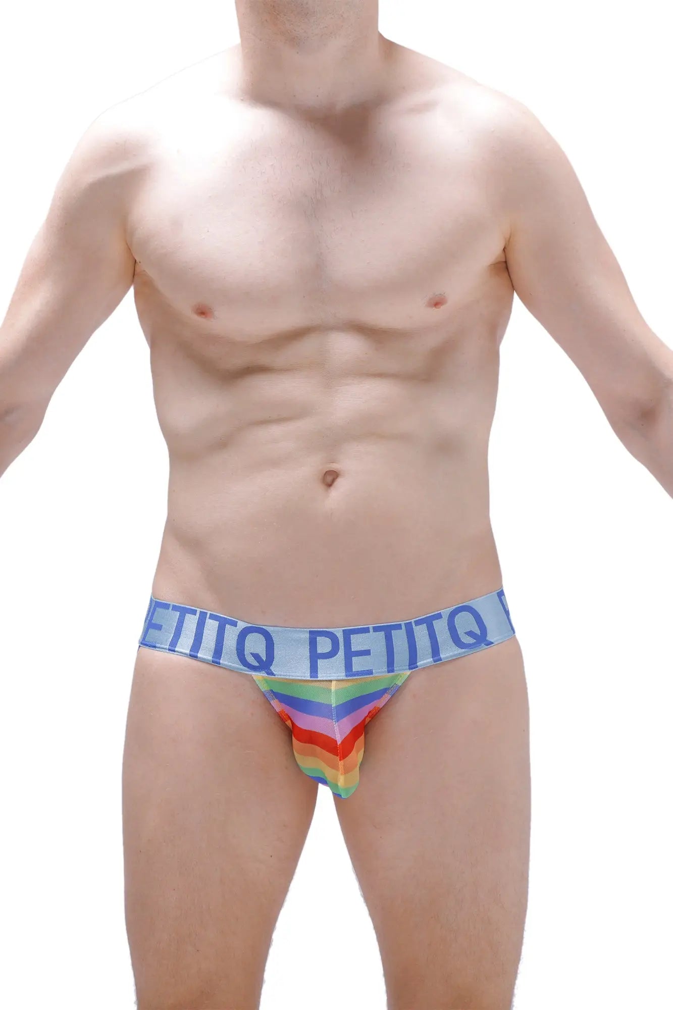 Rainbow-striped men’s briefs with a light blue petitq waistband in bold black letters from Jockstrap Net Rainbow collection