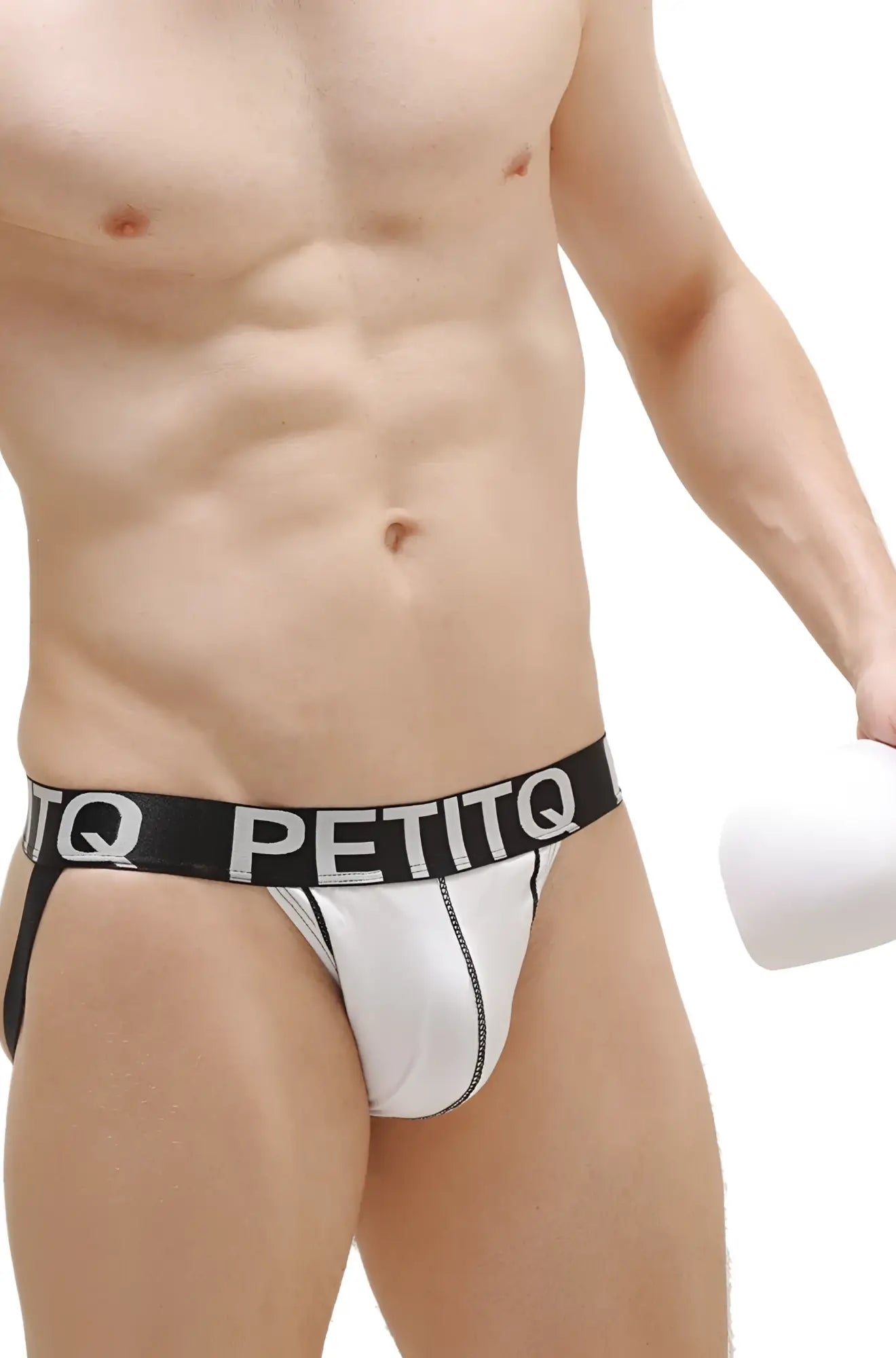White petitq brand briefs jockstrap with black waistband and white lettering featuring padded support