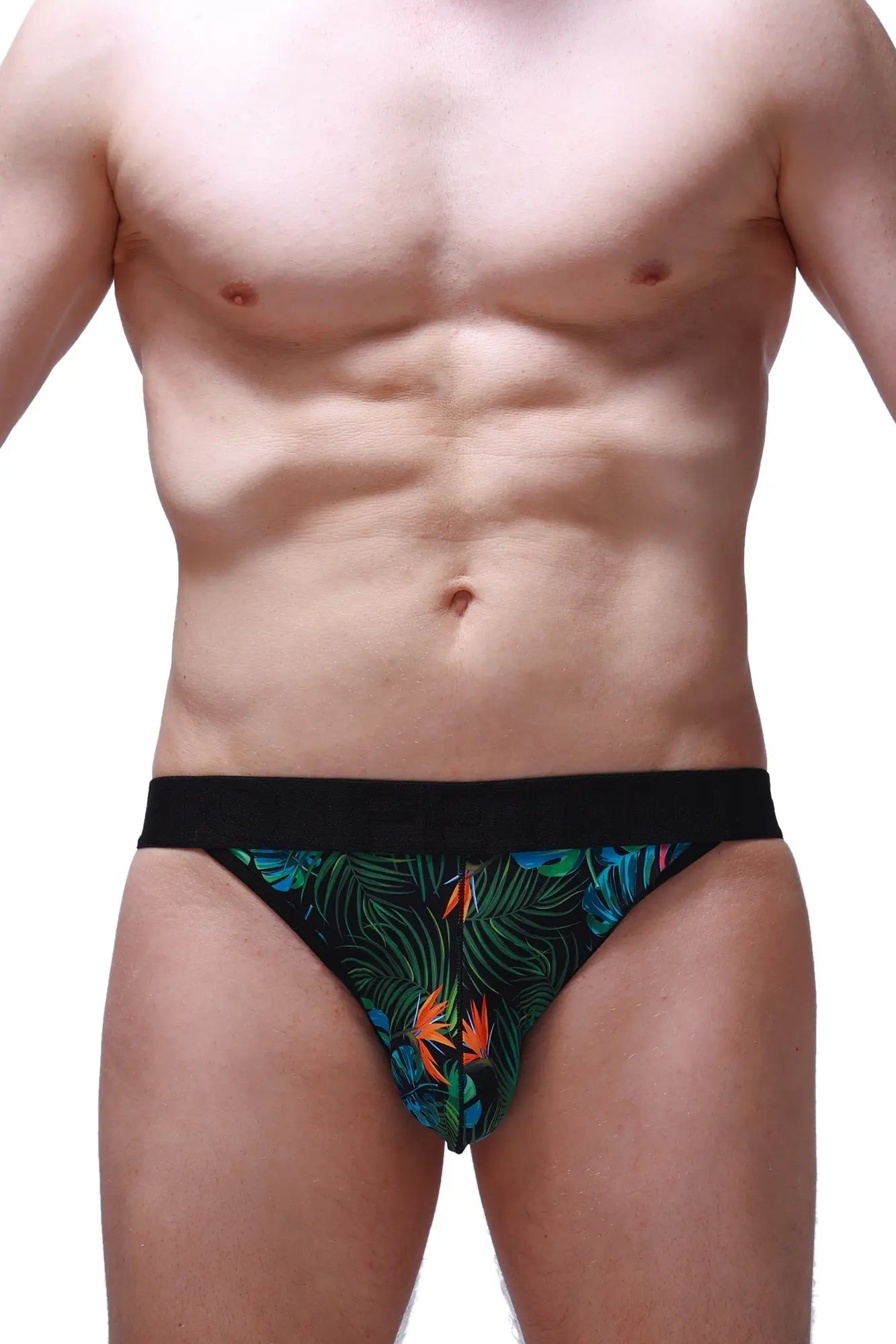 Black jockstring tropical briefs with vibrant green blue and orange tropical leaf and bird pattern