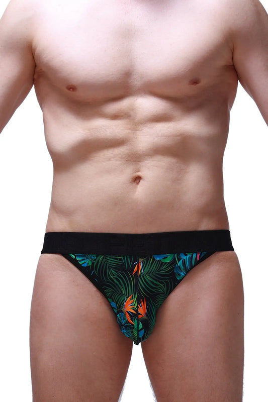 Black jockstring tropical briefs with vibrant green blue and orange tropical leaf and bird pattern