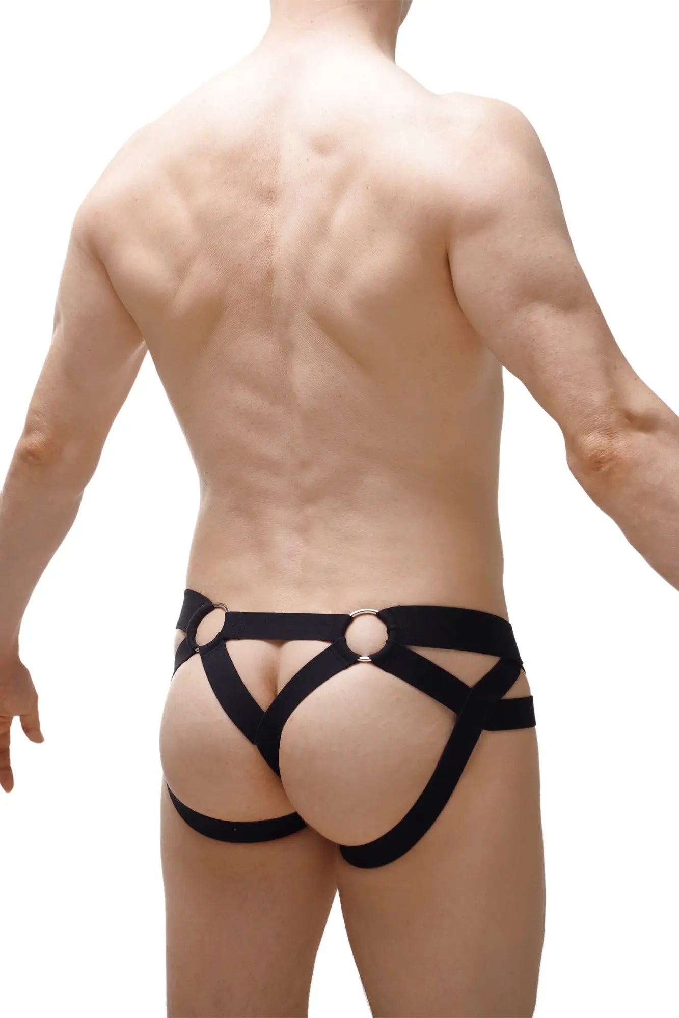 Black harness-style jockthong briefs with metallic rings at front and back in a sleek 2023 design