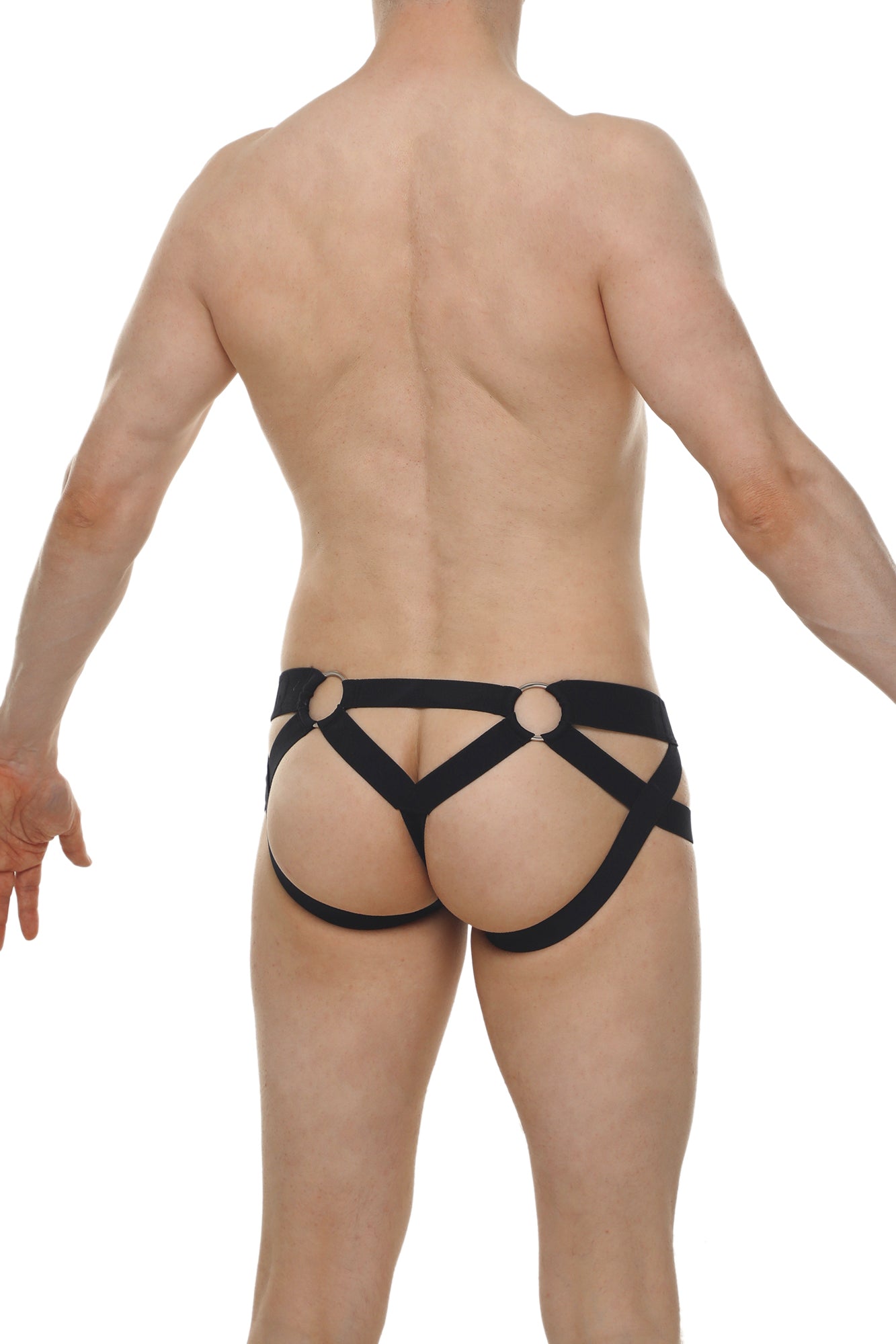 Black harness-style jock thong briefs with crisscross design and circular metal rings in lace material