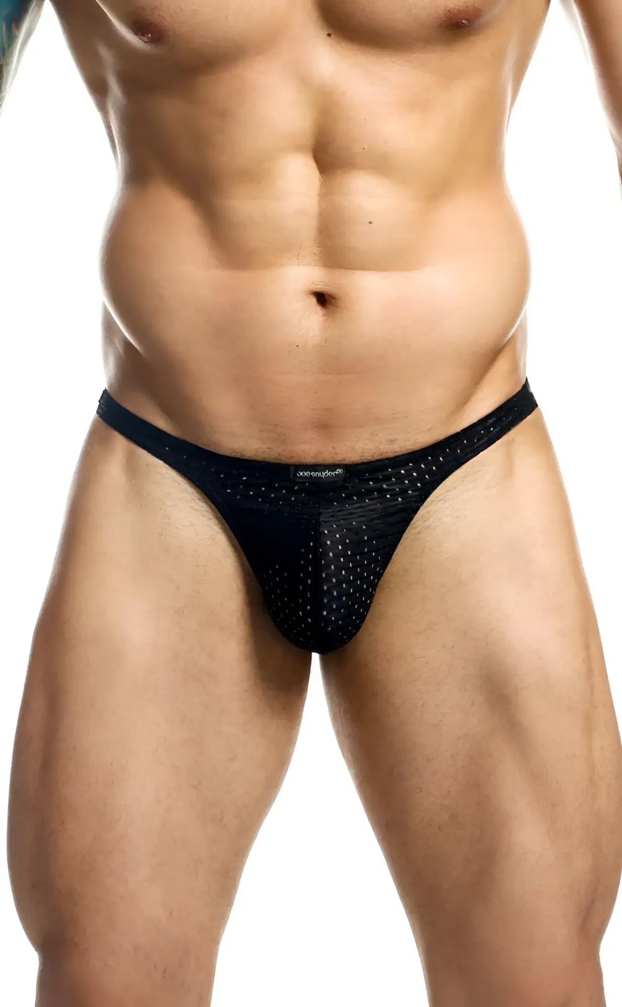 Black mesh Joe Snyder Holes thong with perforated design and small brand tag at waistband shown from the back side