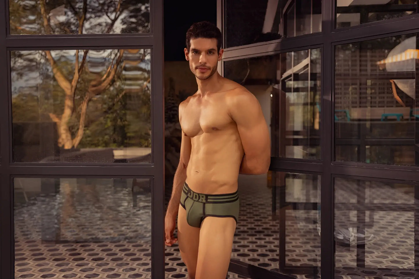 Olive green jor 1944 college briefs with black elastic waistband and white dor logo on front