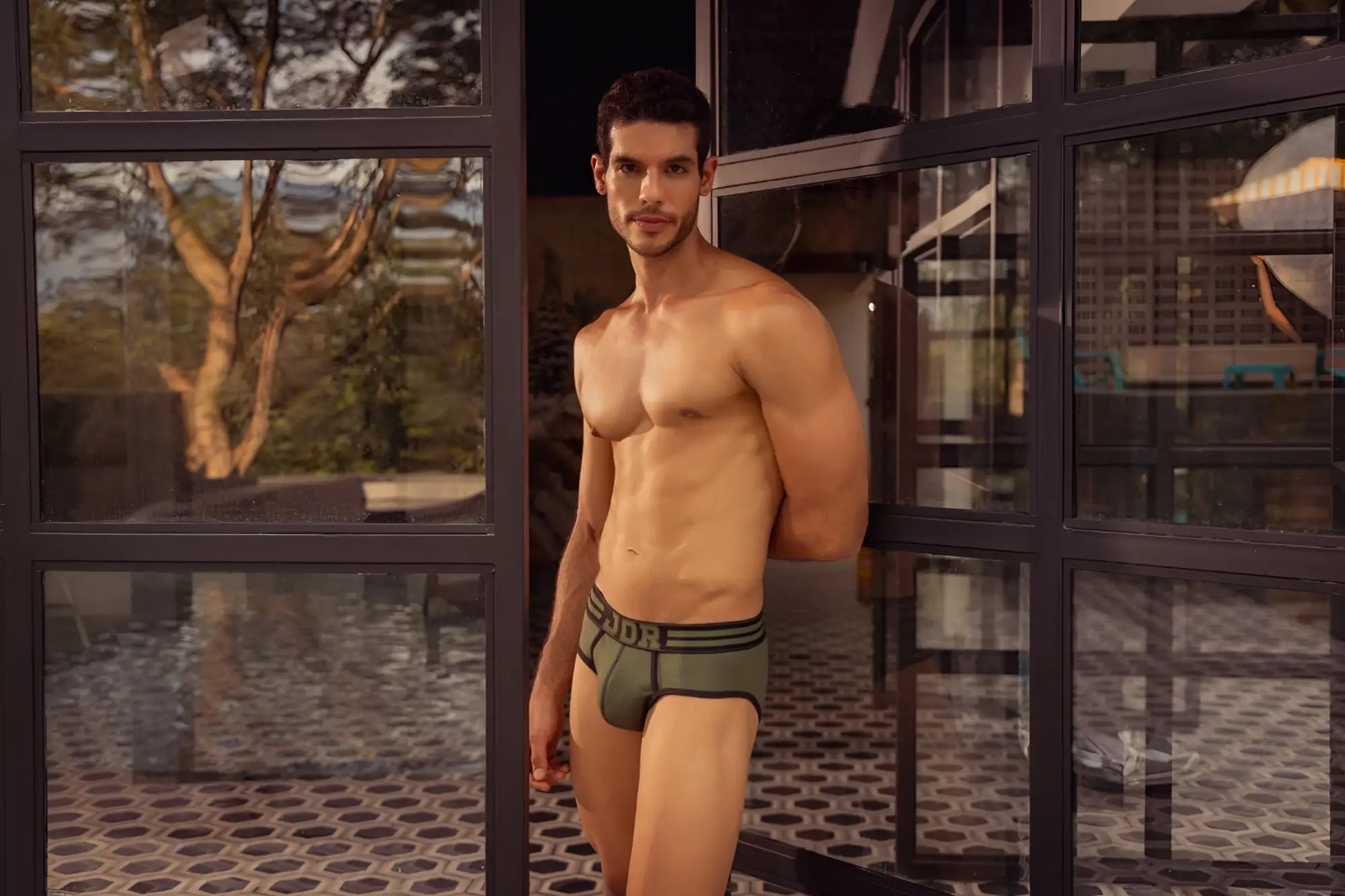 Olive green jor 1944 college briefs with black elastic waistband and white dor logo on front