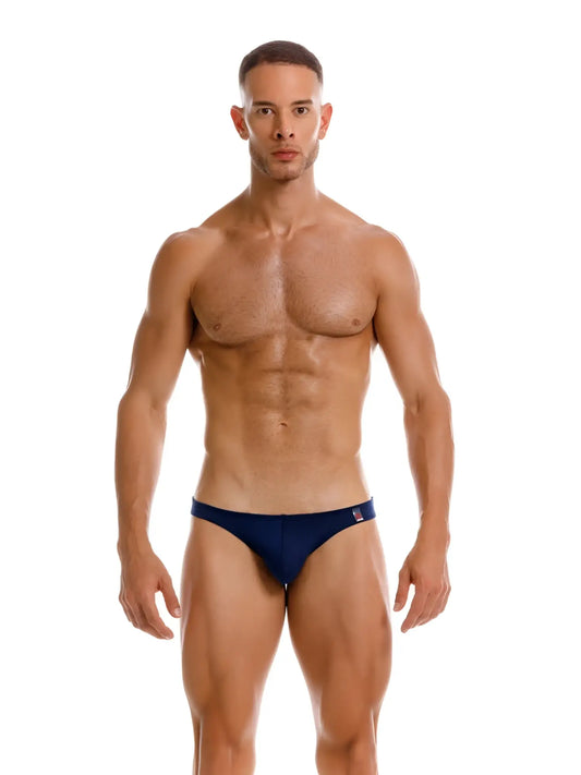 Navy blue swim bikini briefs with a small logo on the waistband designed for travel by jor 2273