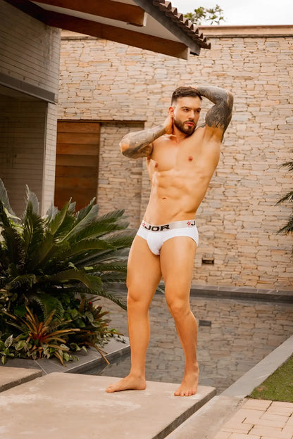 White jor 2331 cronos briefs featuring white branded fabric with a subtle logo on the waistband front view
