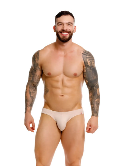 Beige jor 2348 invisible bikini briefs with a subtle red logo on the waistband for comfortable athletic wear