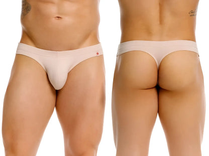 Beige invisible thong with a small red star logo on the waistband showing the front side of the product