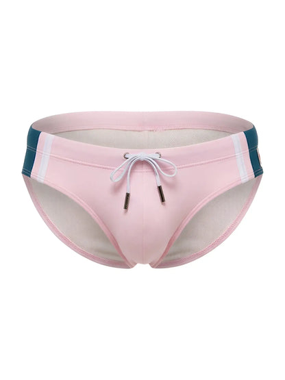 Jor 2384 wind swim briefs in pink with teal and white striped side panels and drawstring closure for swimming