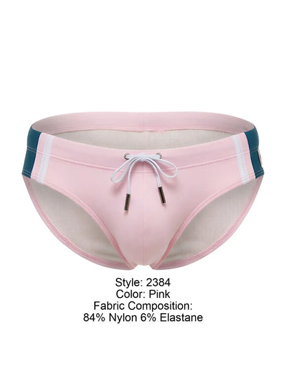 Pink jor 2384 wind swim briefs with teal and white side stripes and a drawstring closure for swimwear use