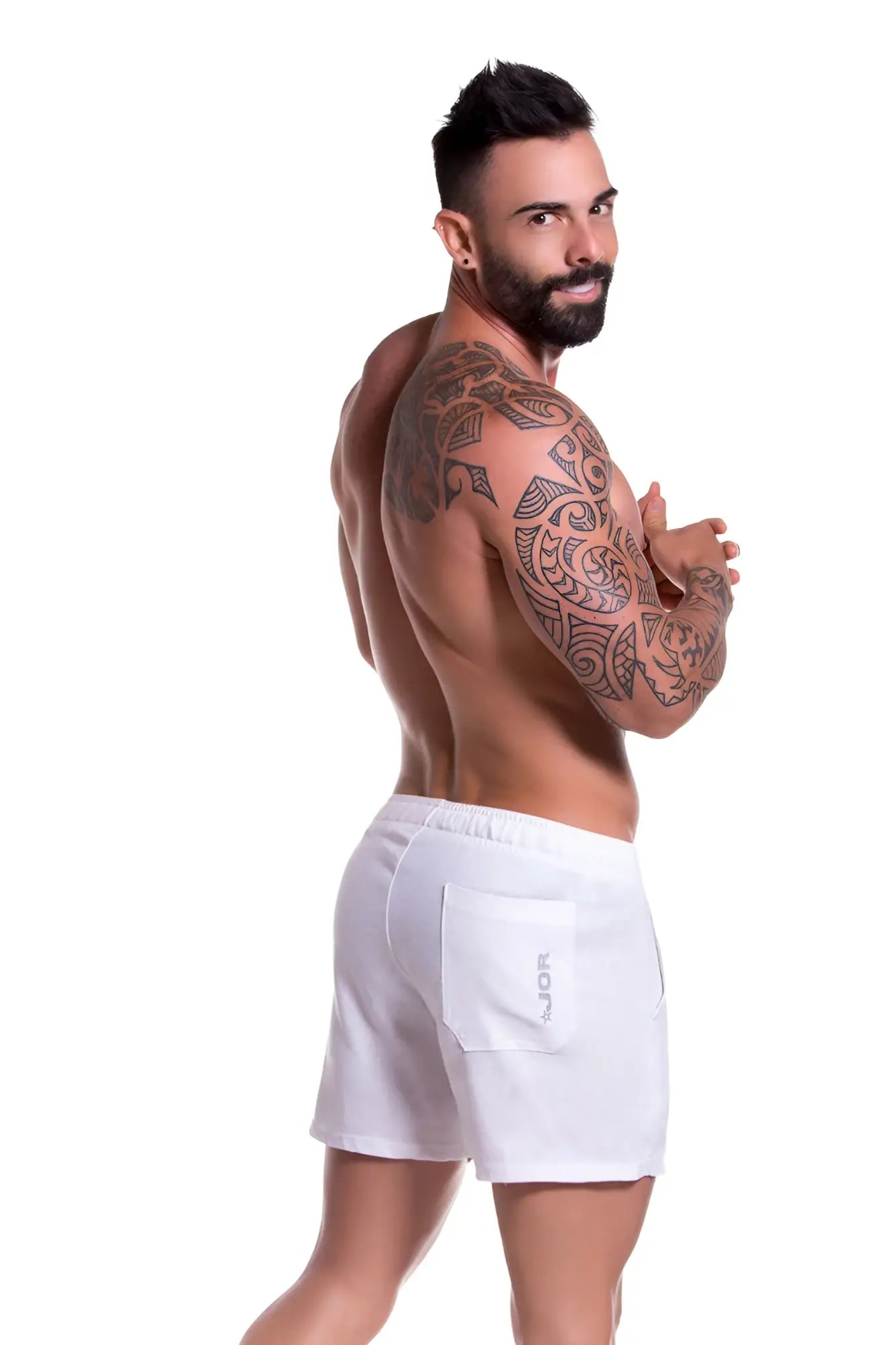 White jor arrecife copacabana mini shorts swimwear in size m with a subtle logo on the side pocket
